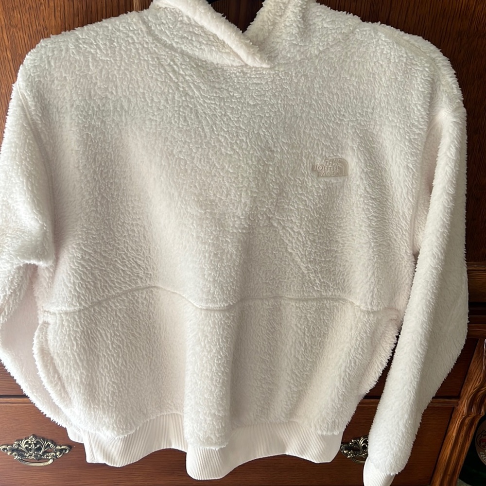 North Face off-white jacket.
